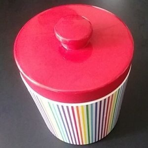 Small vintage rainbow stripes jar with red lid